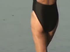 gorgeous mulatto beauty at the beach wearing a gorgeous bikini